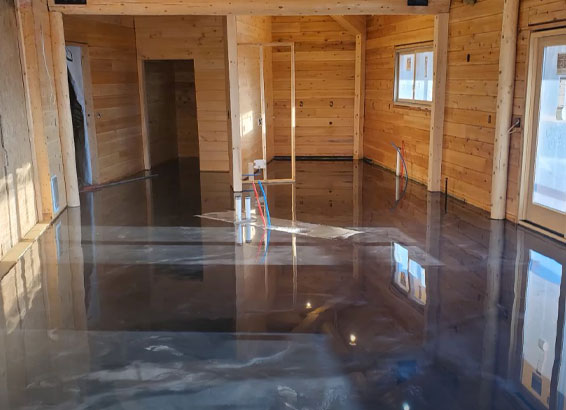 This image shows a commercial space with a gray epoxy floor.